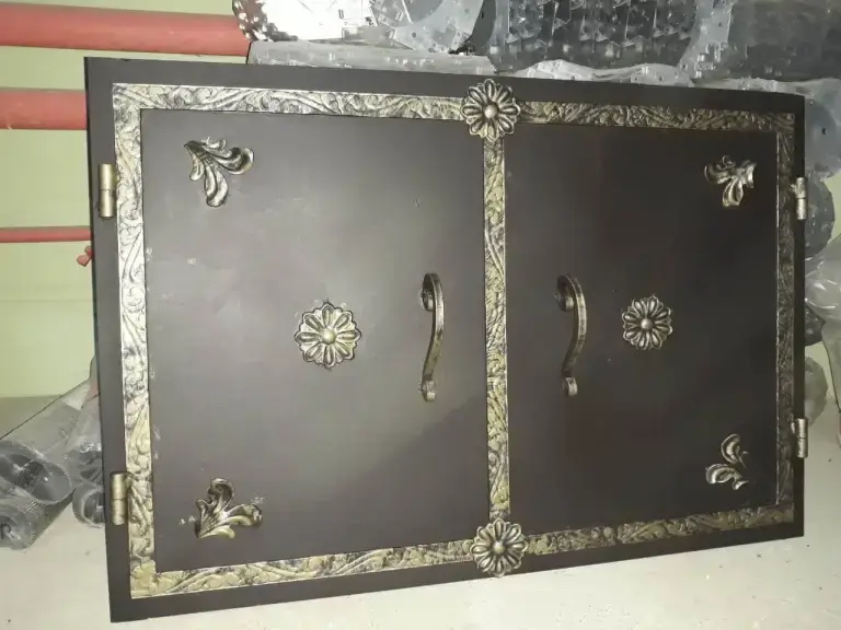 Металлические ставни с элементами ковки в частный дом